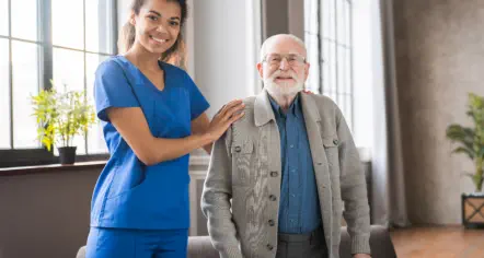 caring nurse with elderly